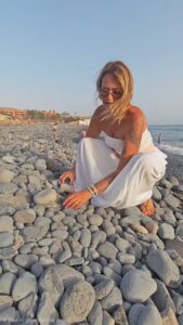 Mathilda sitting comfortably on the beach in Tenerife